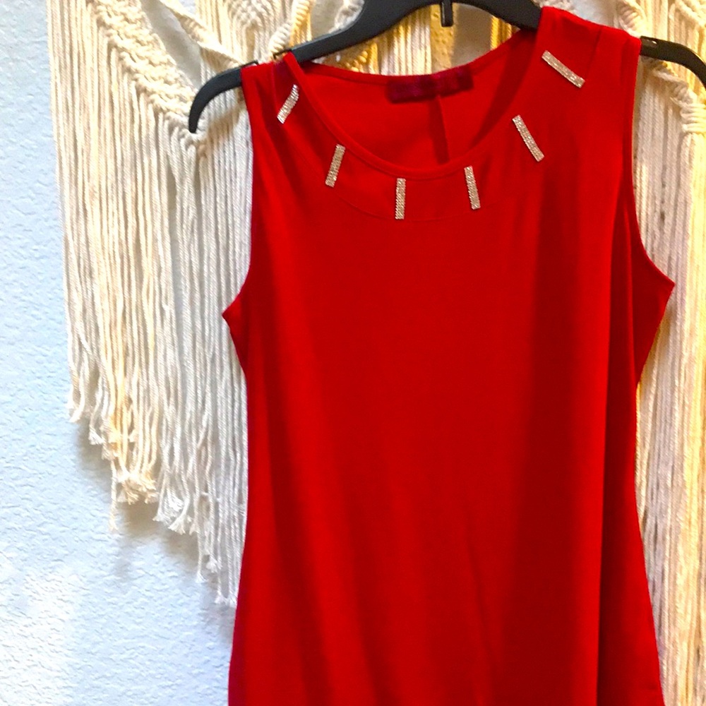 Beautiful cranberry  top with rhinestone detail!